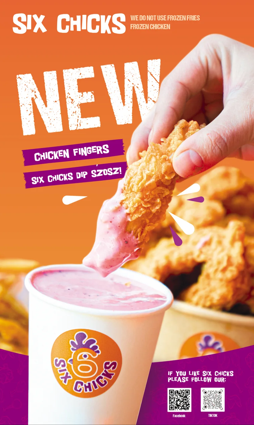 A crispy chicken finger dipped into Six Chicks sauce